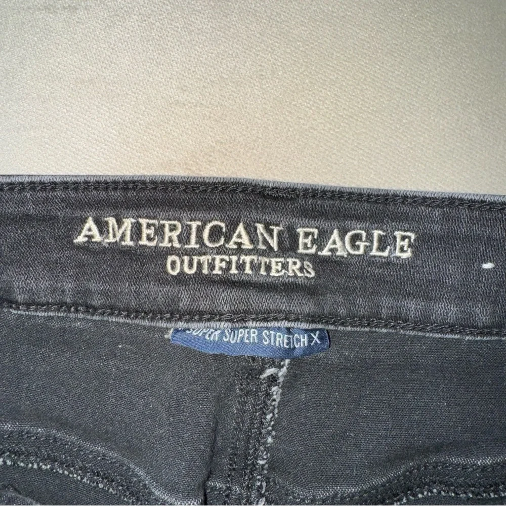 American Eagle Hi-Rise Shortie Black Shorts Size: 4
